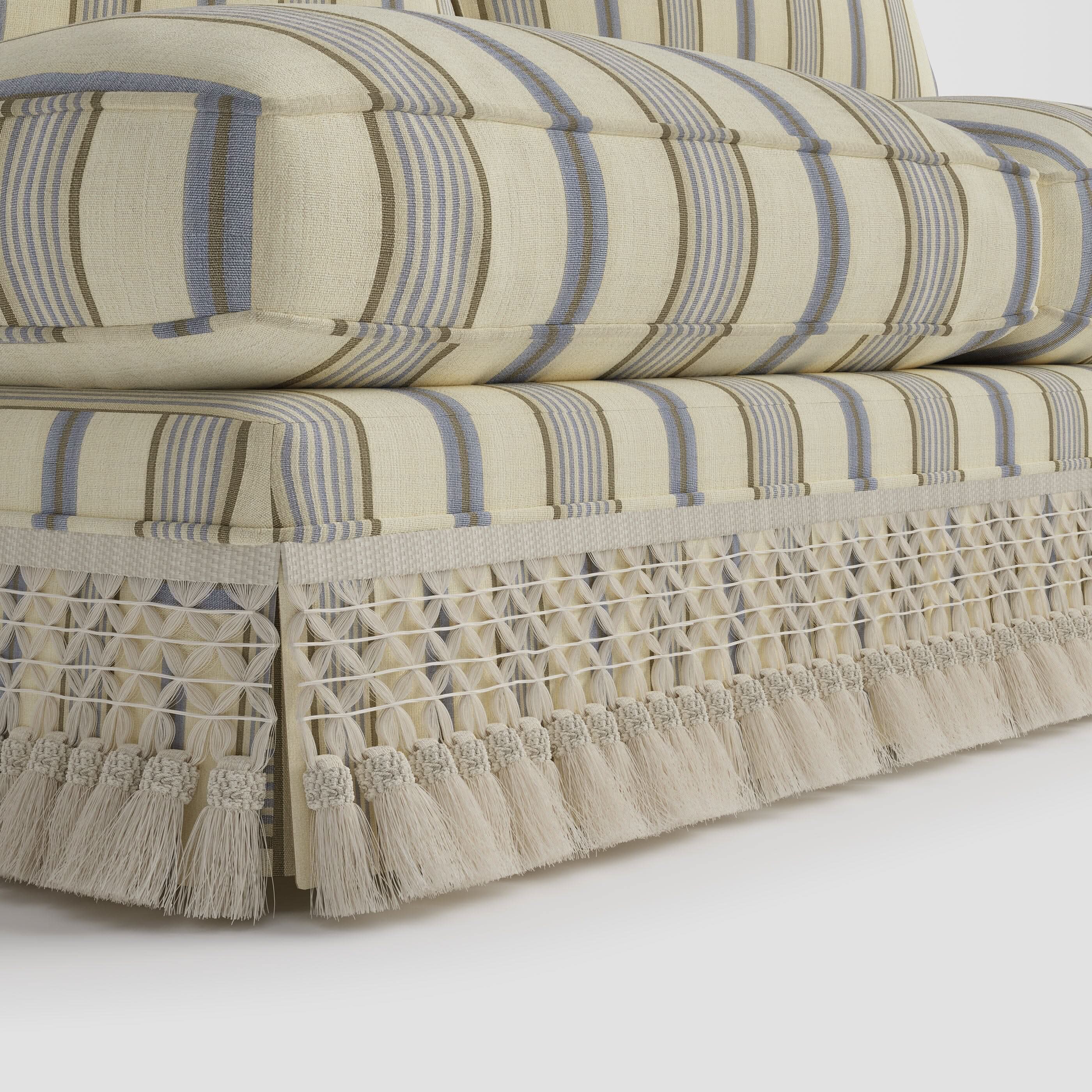 Armless Sofa with Fringed Trim and Removable Covers